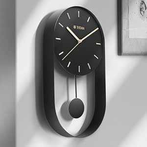 Titan Black Metal Pendulum Wall Clock with Open Dial, Gold-Tone Hands & Indices, Silent Sweep, Model W0086MP01 | 45 cm x 24.5 cm x 5.5 cm